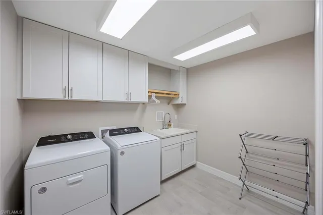 a view of a city from a dining room with furniture