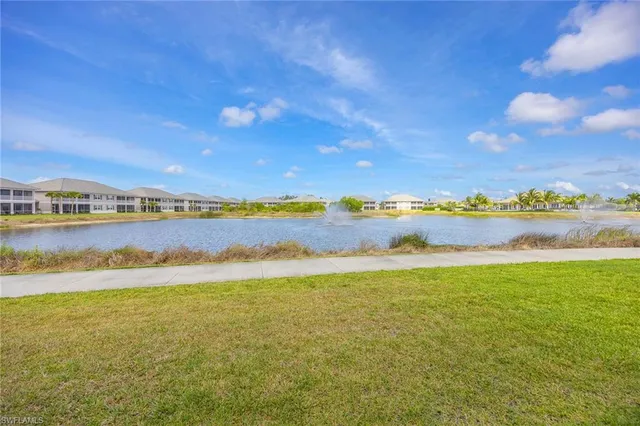 a view of a lake and a yard