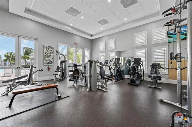 a view of a swimming pool with sitting area