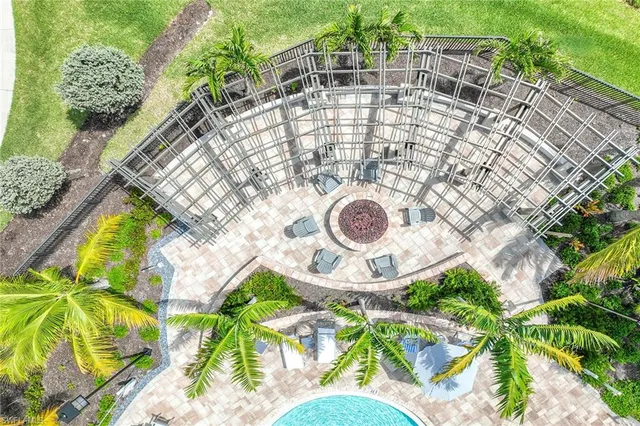 a view of a backyard with a tree