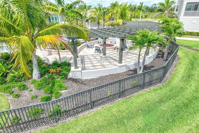 a view of a swimming pool with a patio