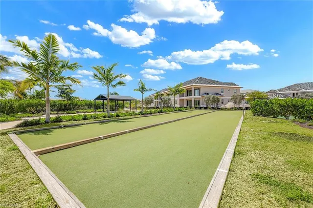 a view of front of house with potted plants