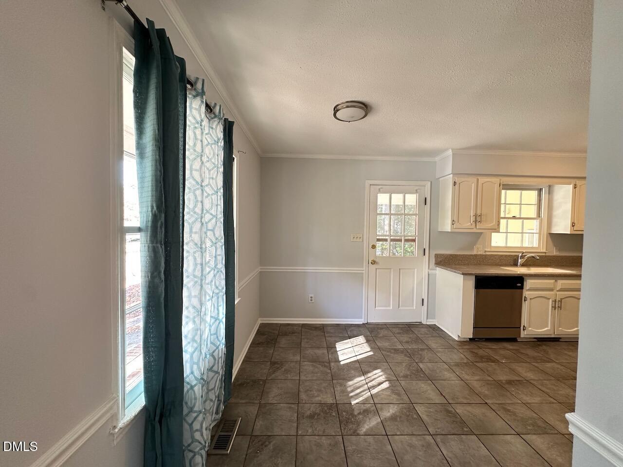 3717 Sue Ellen Drive Raleigh, NC 27604 - Photo 7 of 20 a view of a open shower and a window