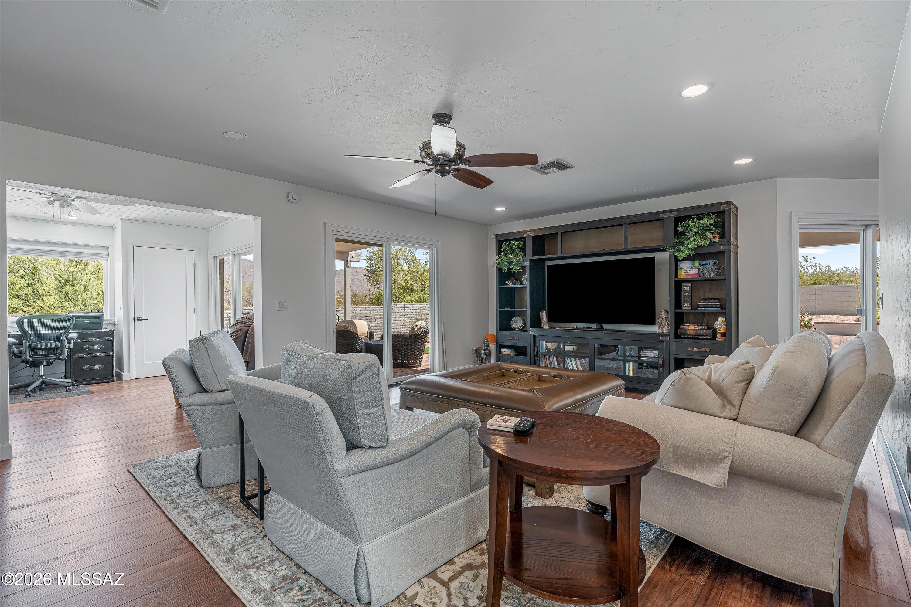 10015 East Fort Lowell Road Tucson, AZ 85749 - Photo 2 of 45 Living looking to den and patio