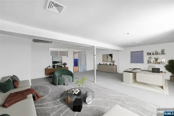 a living room with furniture and a couch