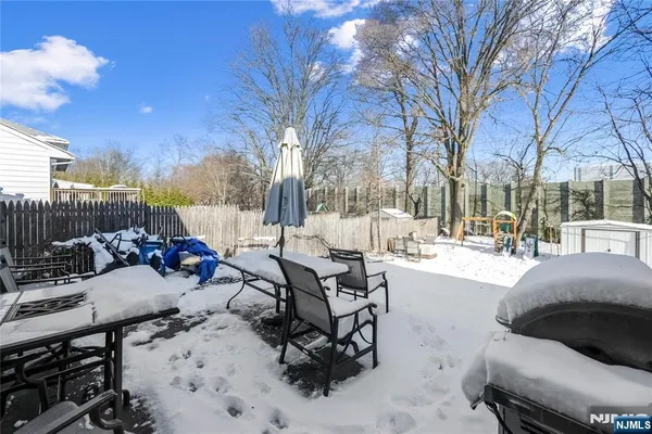 a view of a patio with a yard