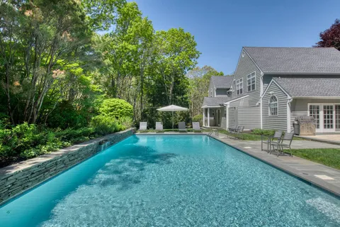 a house view with a garden space