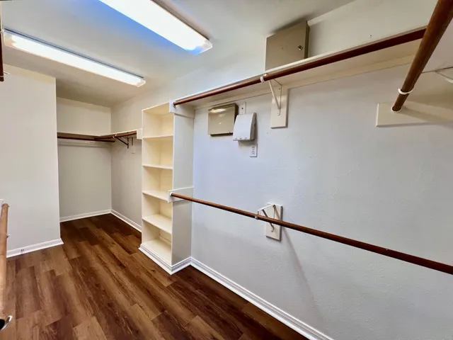 a view of entryway with wooden floor