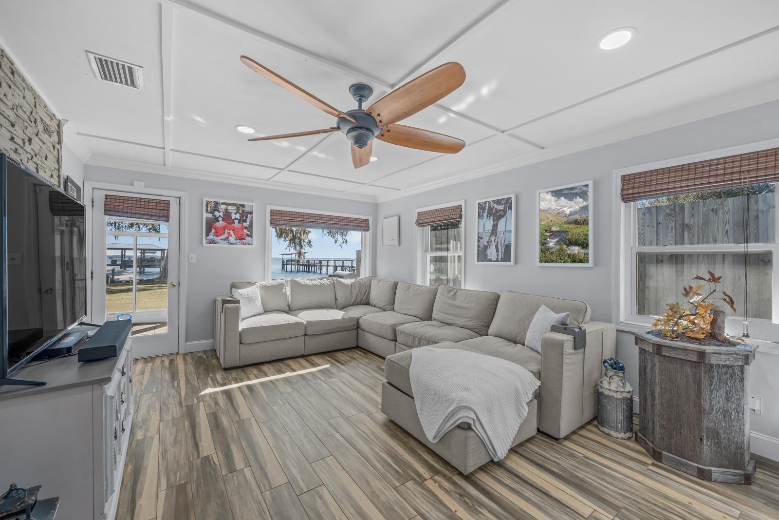 130 Cedar Creek Road Palatka, FL 32177 - Photo 14 of 73 a living room with furniture and a flat screen tv