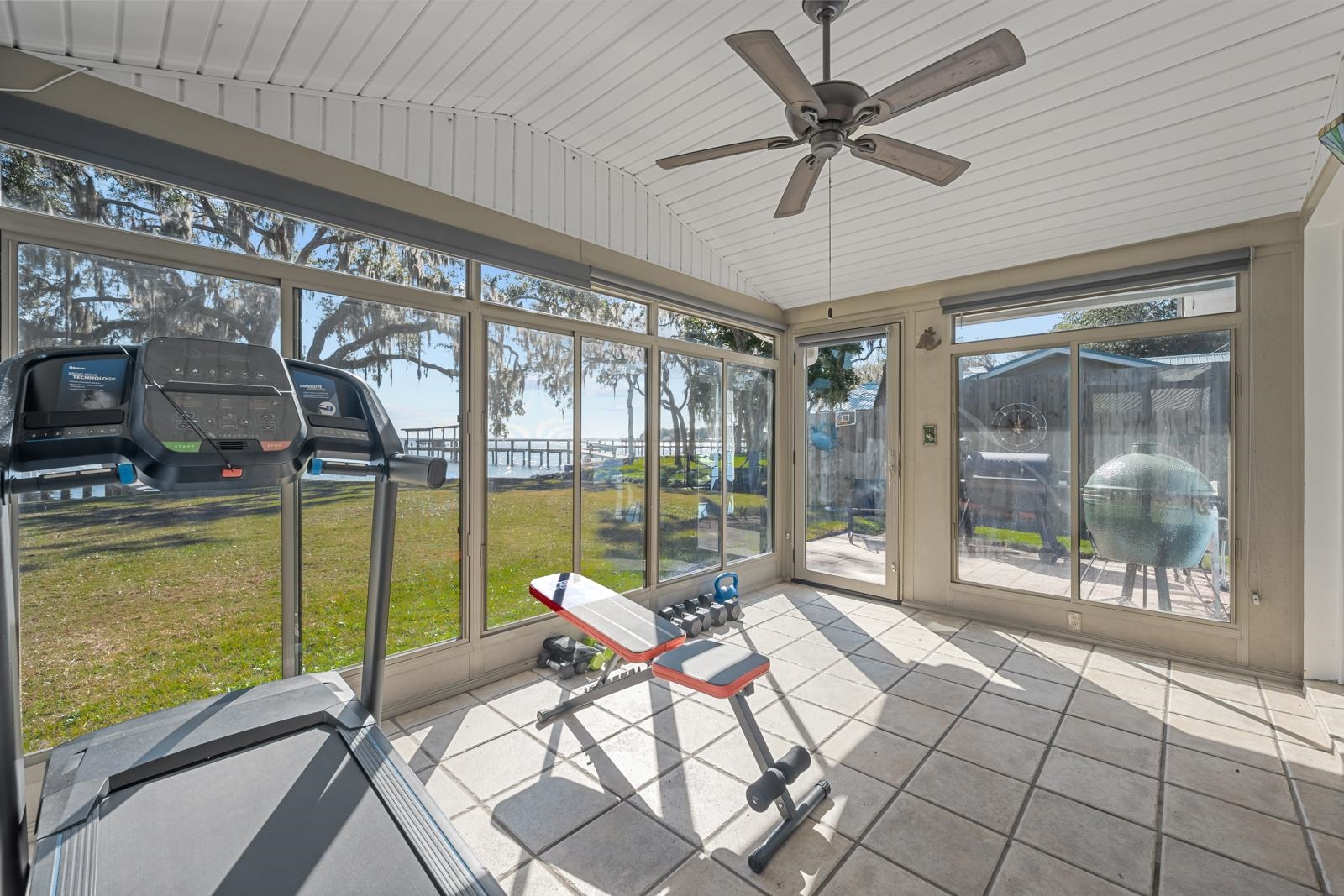 130 Cedar Creek Road Palatka, FL 32177 - Photo 23 of 73 a living room with furniture and floor to ceiling windows
