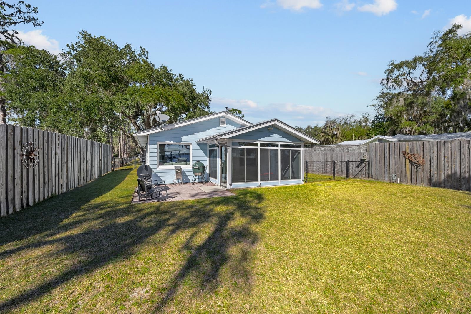 130 Cedar Creek Road Palatka, FL 32177 - Photo 26 of 73 a front view of house with yard and swimming pool