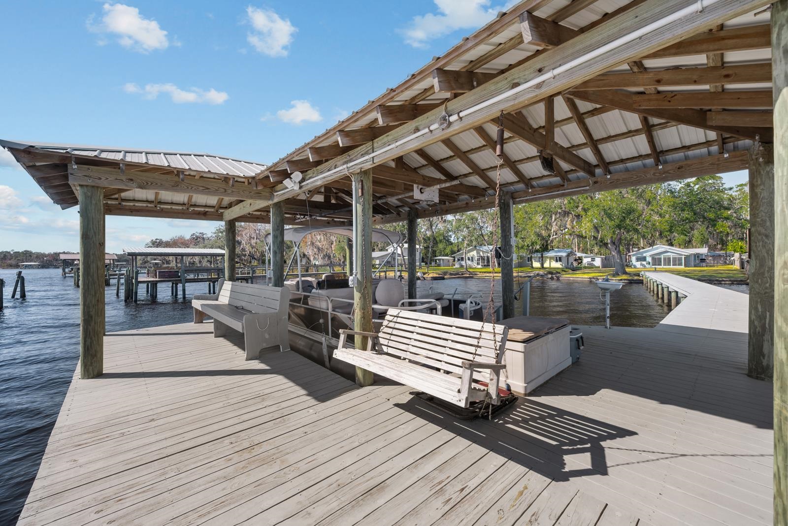 130 Cedar Creek Road Palatka, FL 32177 - Photo 36 of 73 Dock area featuring boat lift and a water view