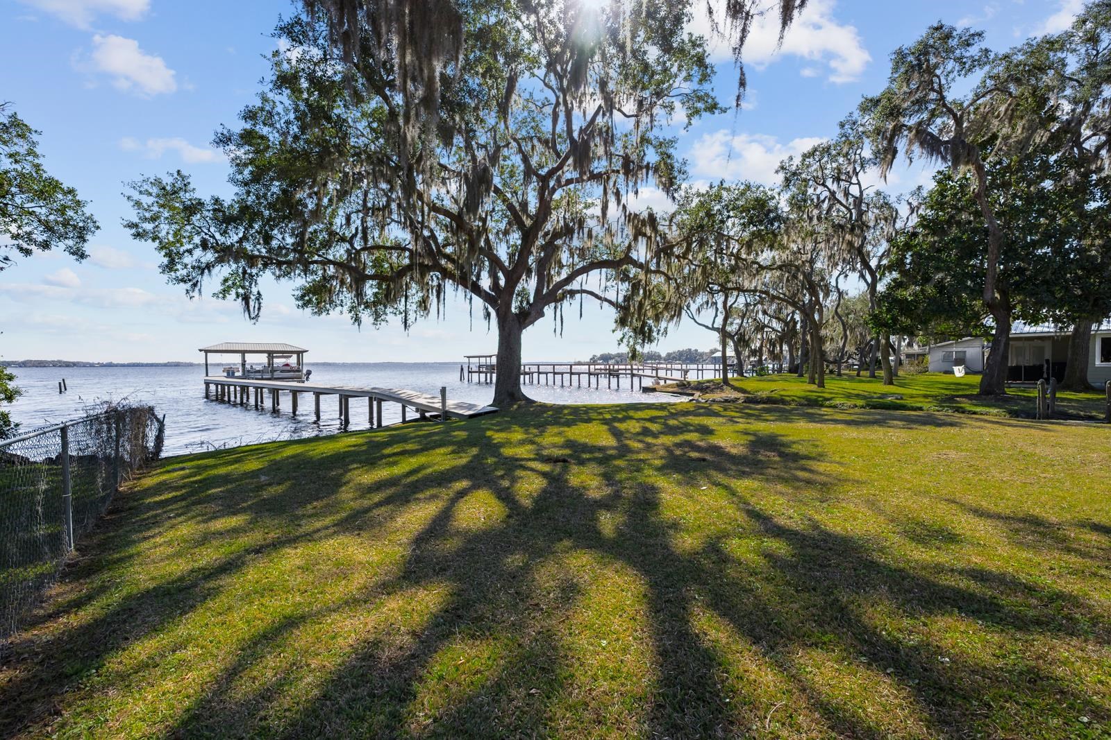 130 Cedar Creek Road Palatka, FL 32177 - Photo 39 of 73 a view of swimming pool with outdoor seating and trees