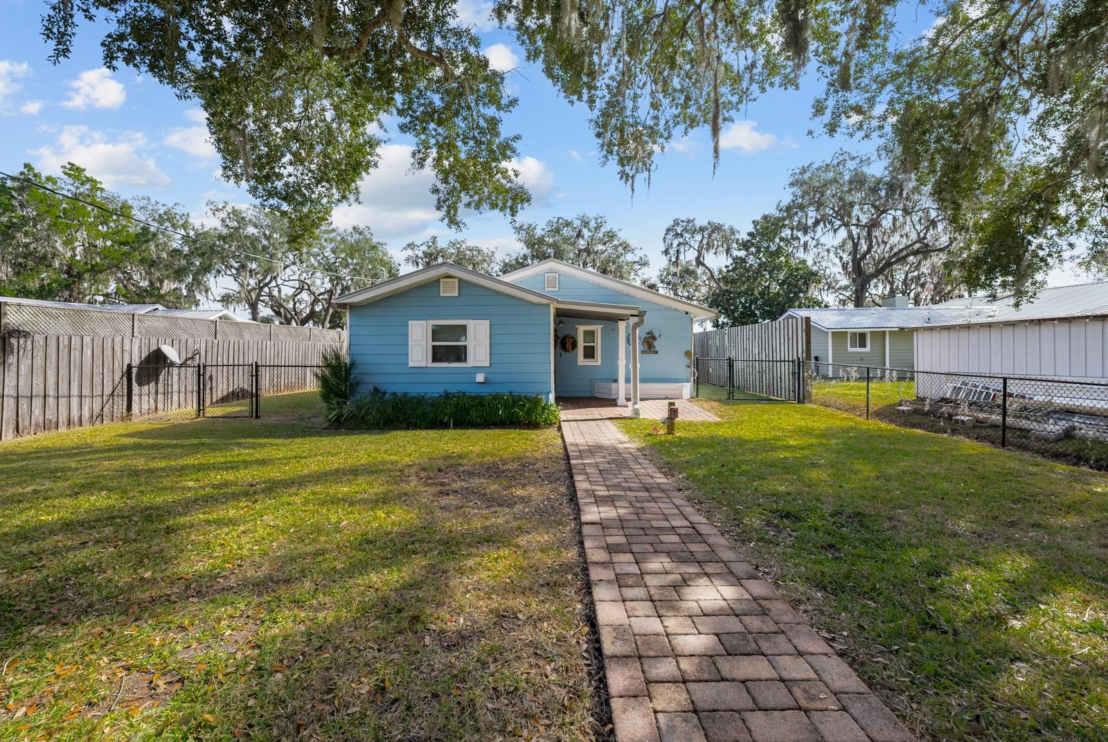 130 Cedar Creek Road Palatka, FL 32177 - Photo 44 of 73 Back of property featuring a fenced backyard