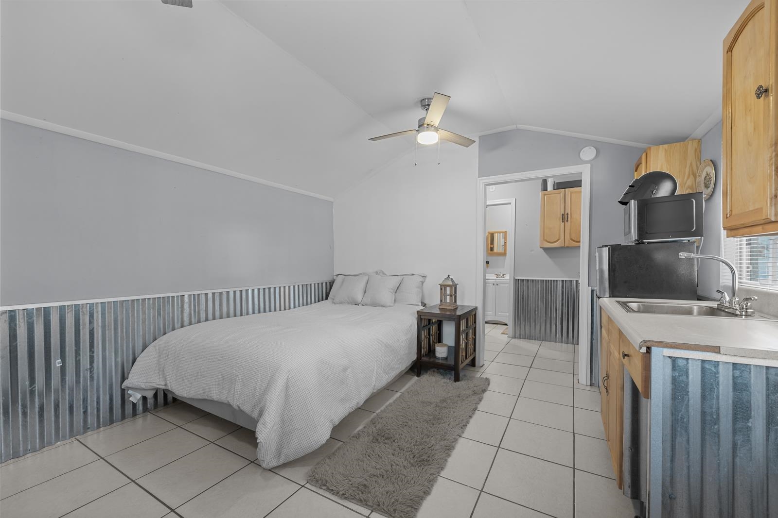 130 Cedar Creek Road Palatka, FL 32177 - Photo 49 of 73 a bed room with a bed and a television