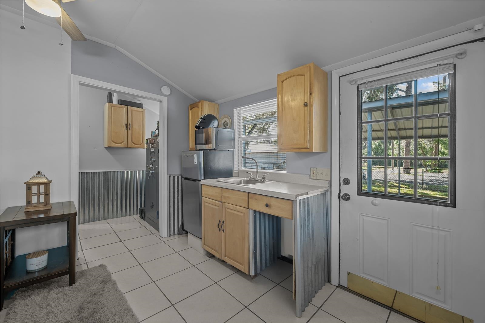 130 Cedar Creek Road Palatka, FL 32177 - Photo 51 of 73 a spacious bathroom with a granite countertop sink a mirror and a bathtub