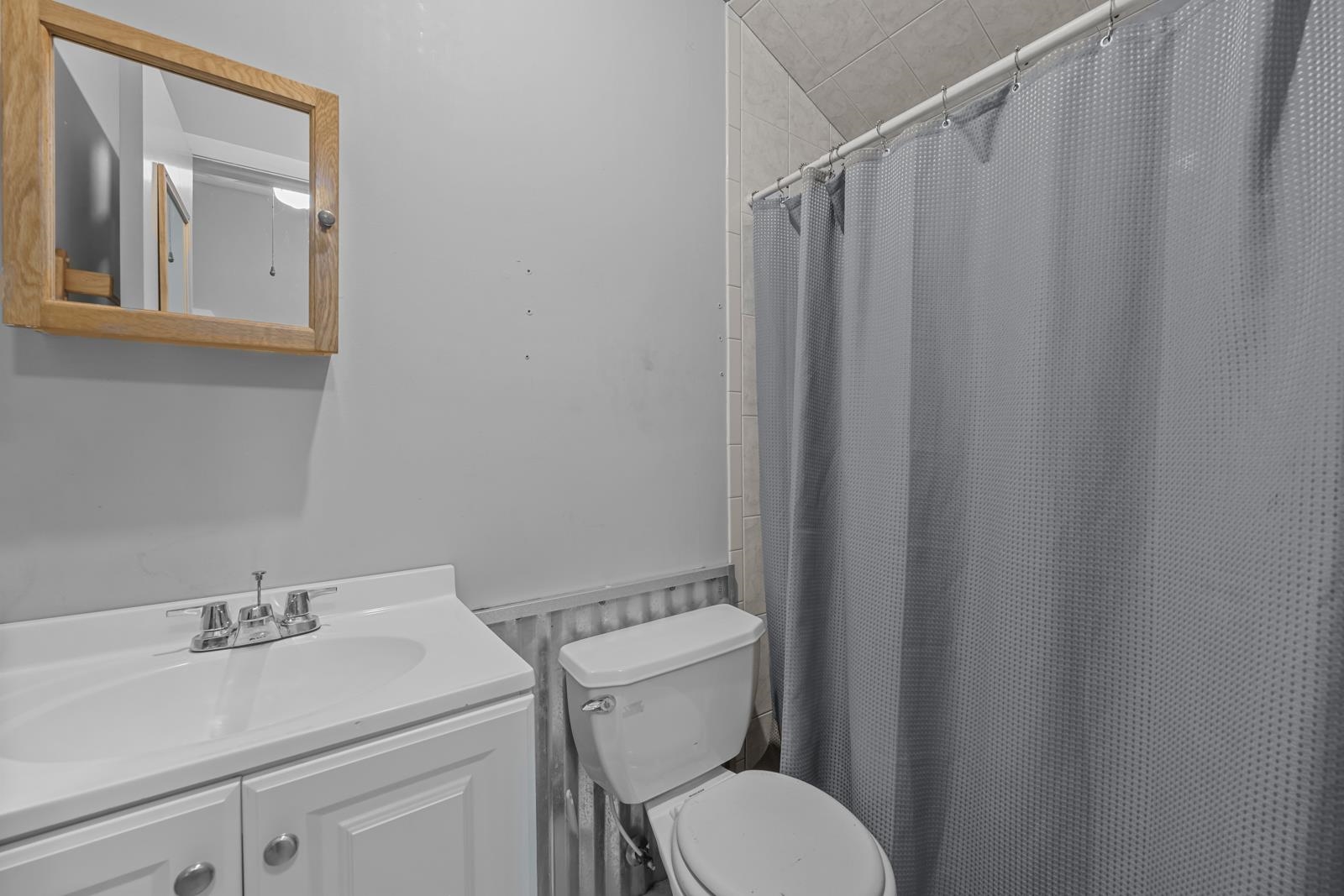 130 Cedar Creek Road Palatka, FL 32177 - Photo 53 of 73 a white toilet sitting next to a bathroom sink