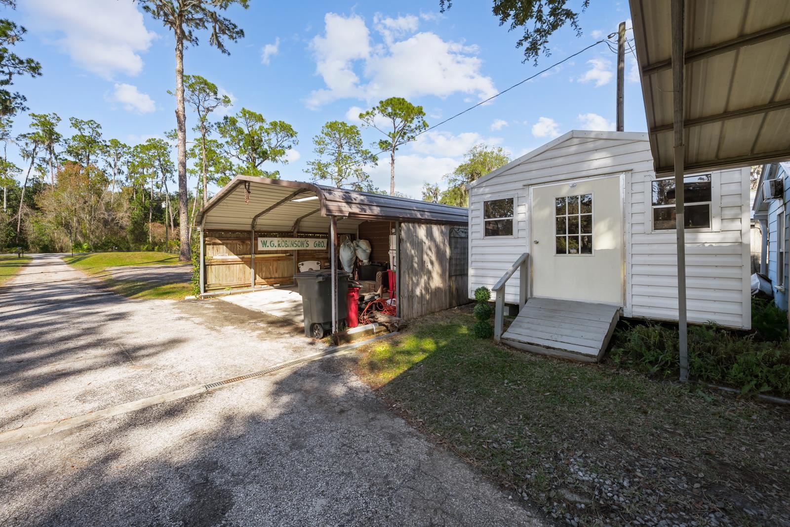 130 Cedar Creek Road Palatka, FL 32177 - Photo 55 of 73 a view of a house with a backyard porch and sitting area