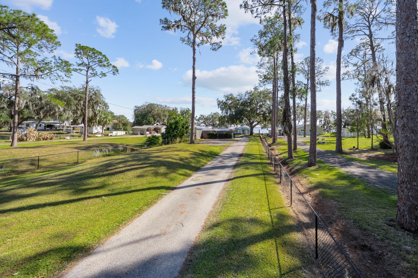 130 Cedar Creek Road Palatka, FL 32177 - Photo 58 of 73 a swimming pool with outdoor seating and yard