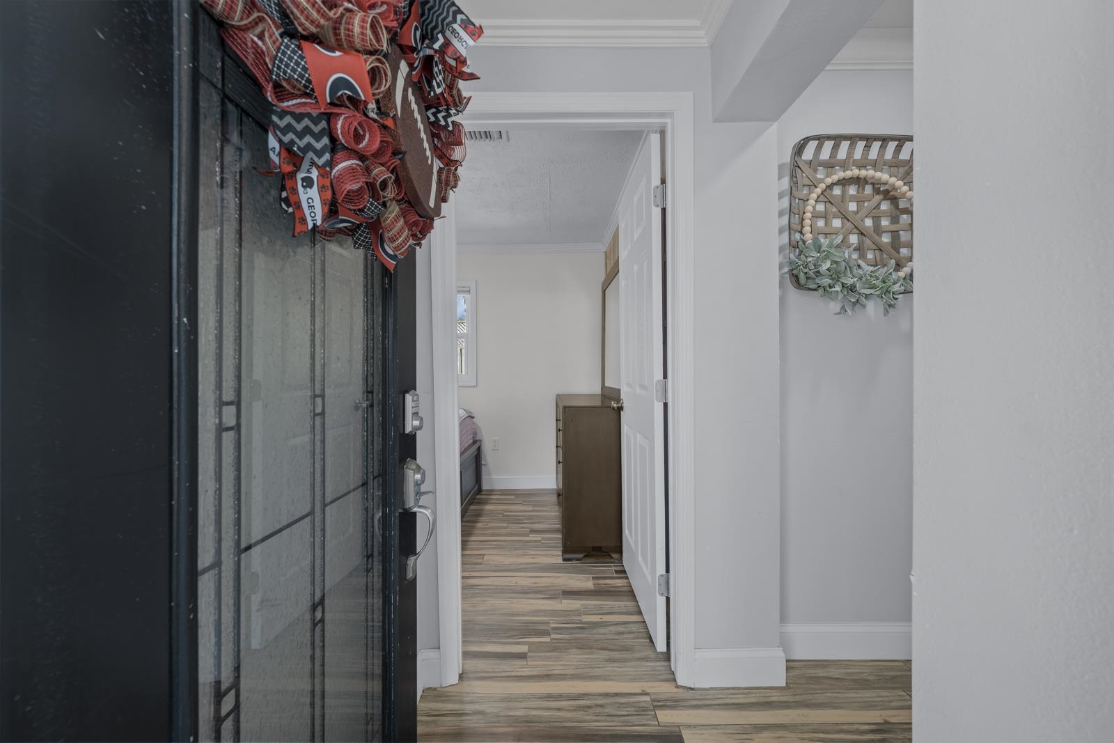 130 Cedar Creek Road Palatka, FL 32177 - Photo 6 of 73 a view of a hallway with wooden floor and entryway