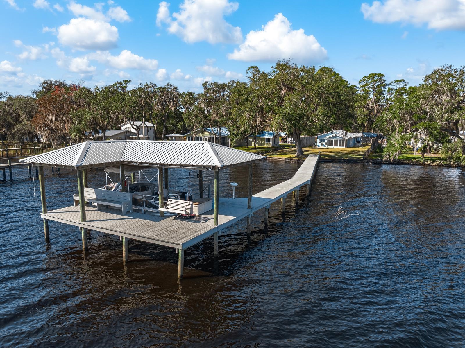 130 Cedar Creek Road Palatka, FL 32177 - Photo 61 of 73 a view of a terrace with sitting area