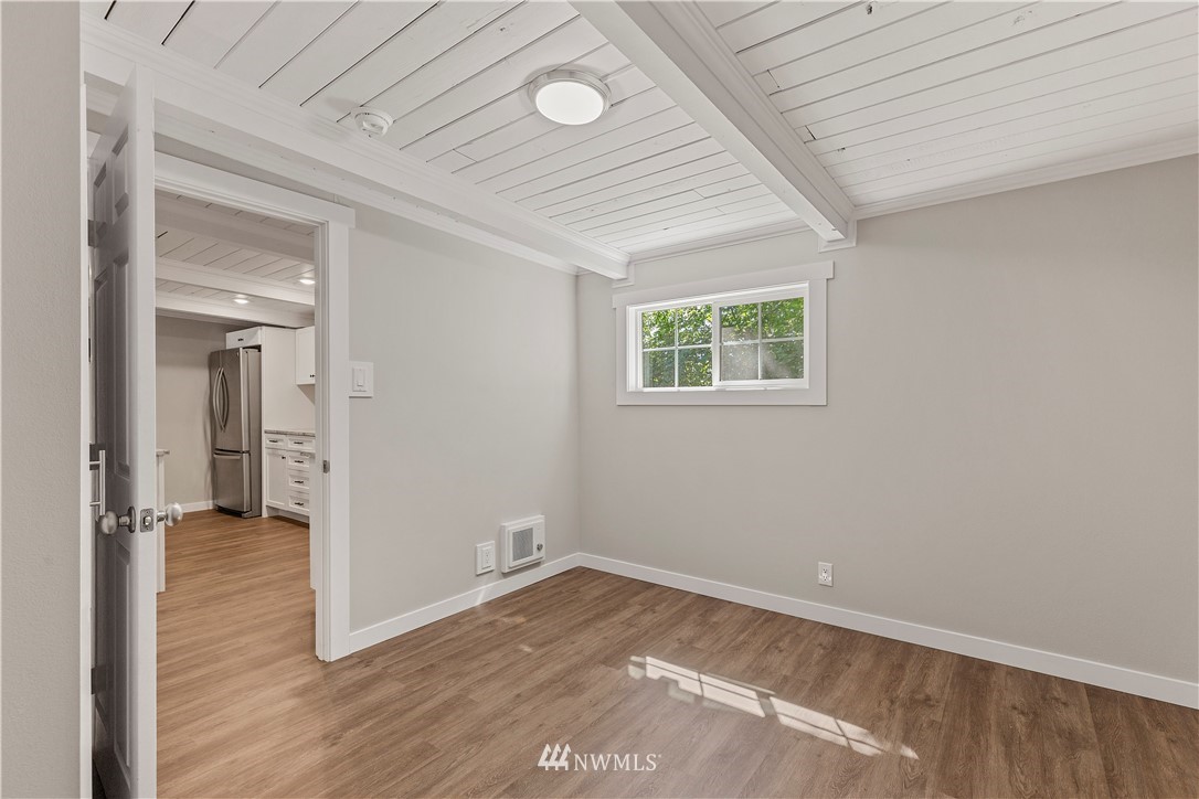 17610 Blodgett Road Mount Vernon, WA 98274 - Photo 20 of 30 an empty room with wooden floor and windows