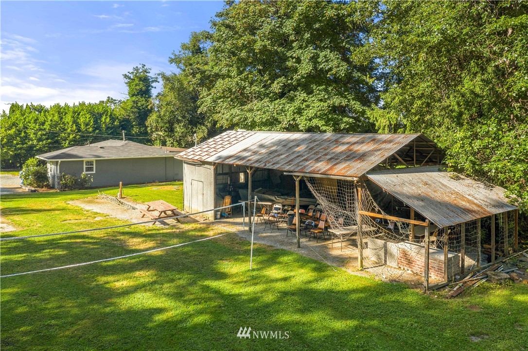 17610 Blodgett Road Mount Vernon, WA 98274 - Photo 29 of 30 a view of a house with a swimming pool