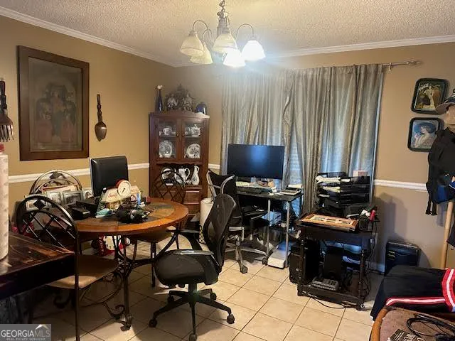 a work room with furniture and wooden floor