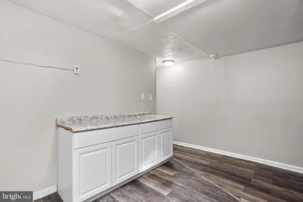 a utility room with washer and dryer