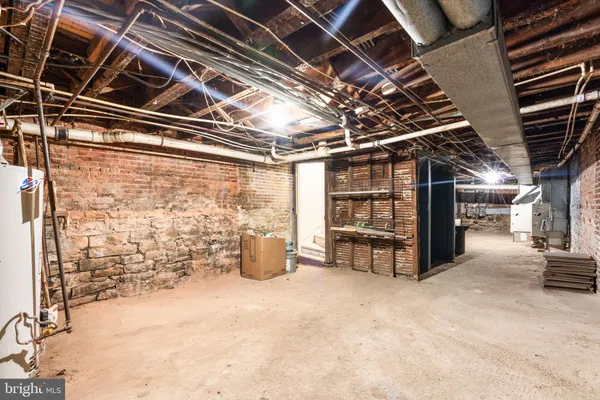 a view of a house with a tree