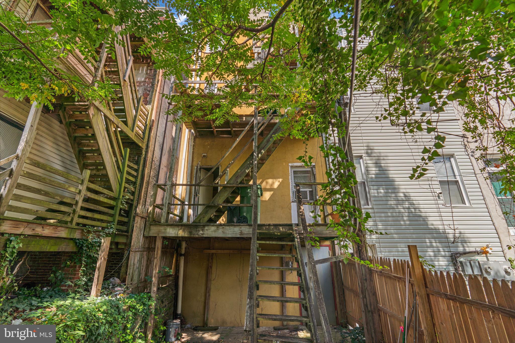 517 Mosher Street Baltimore, MD 21217 - Photo 43 of 45 a view of a house with a tree
