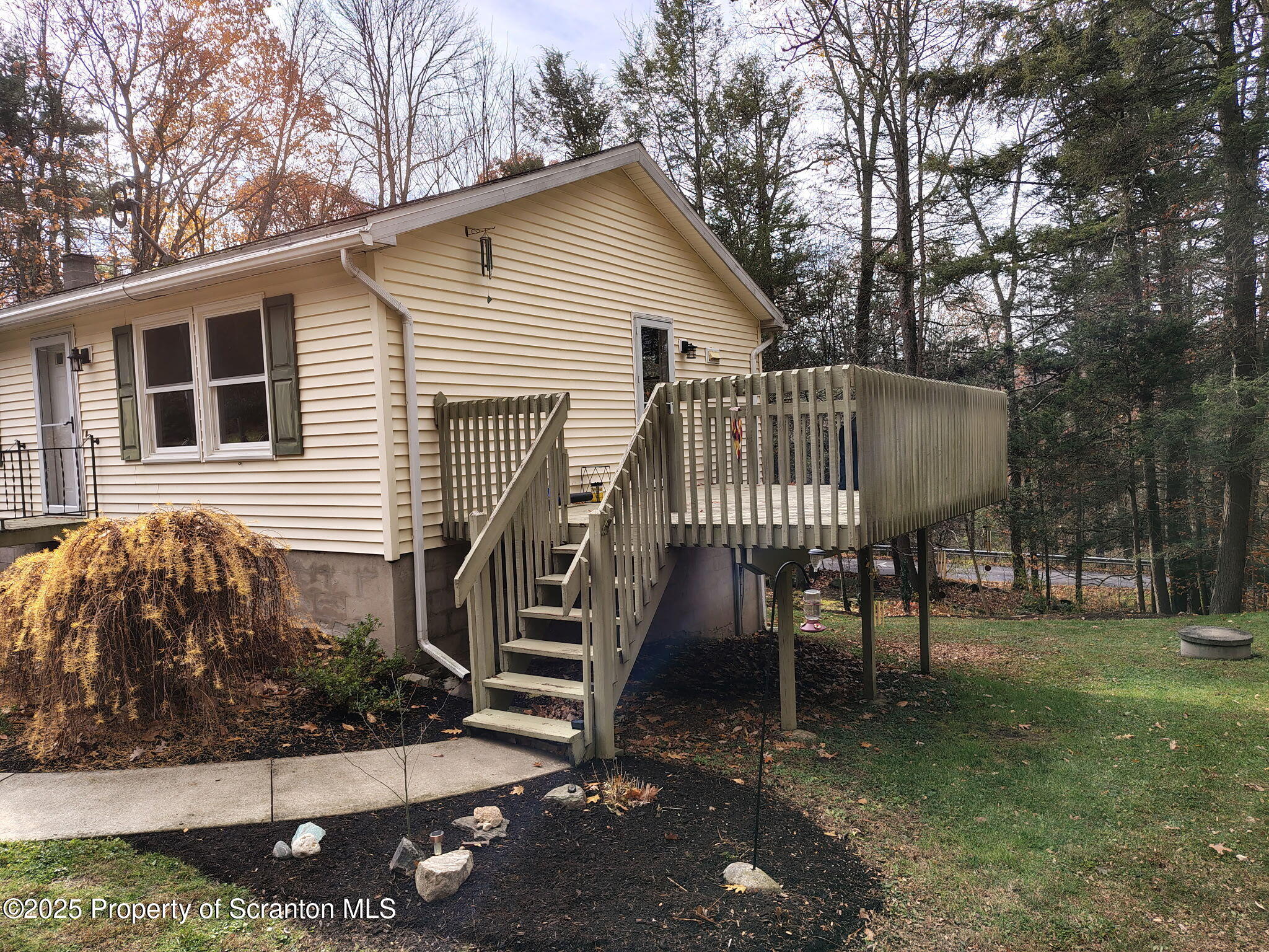 7 Hollow Crest Road Tunkhannock, PA 18657 - Photo 5 of 41 a view of a house with backyard and sitting area