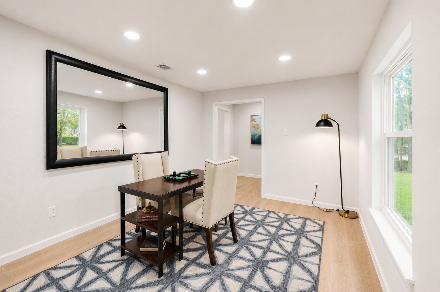 12703 Redfern Drive Houston, TX 77048 - Photo 10 of 28 Whether used as a home office, media room, playroom, or formal sitting area, this thoughtfully updated space blends timeless comfort with modern simplicity.