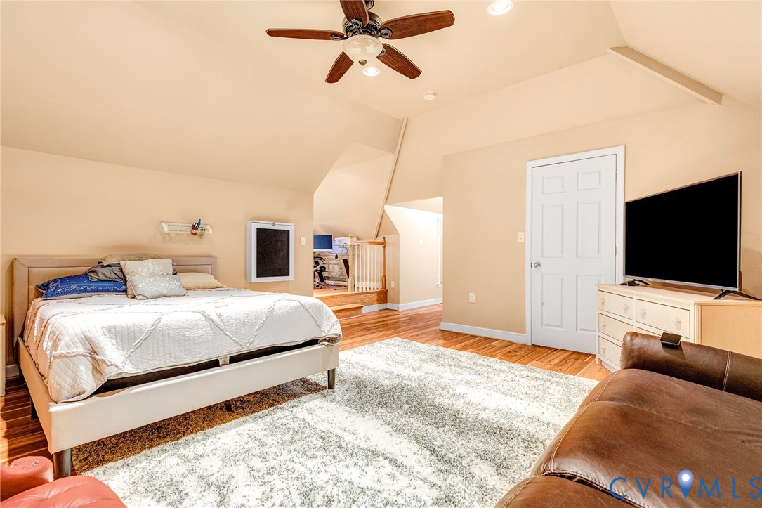 9212 Wyattwood Road Mechanicsville, VA 23116 - Photo 27 of 47 a bedroom with a bed and a flat screen tv