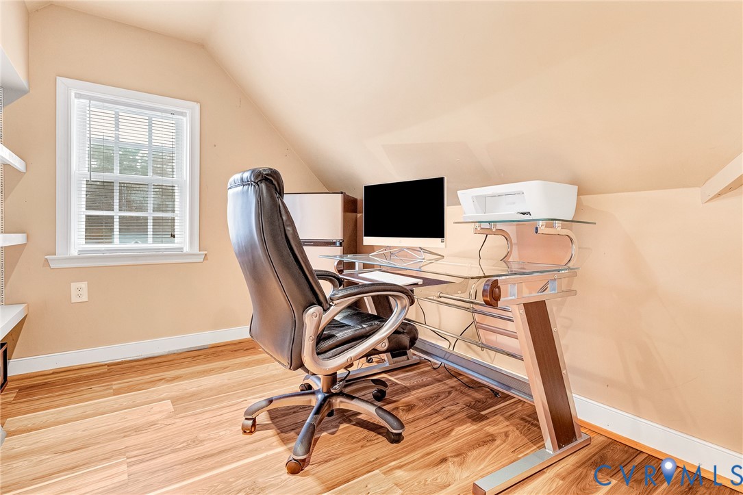 9212 Wyattwood Road Mechanicsville, VA 23116 - Photo 29 of 47 a view of a workspace with furniture and a window