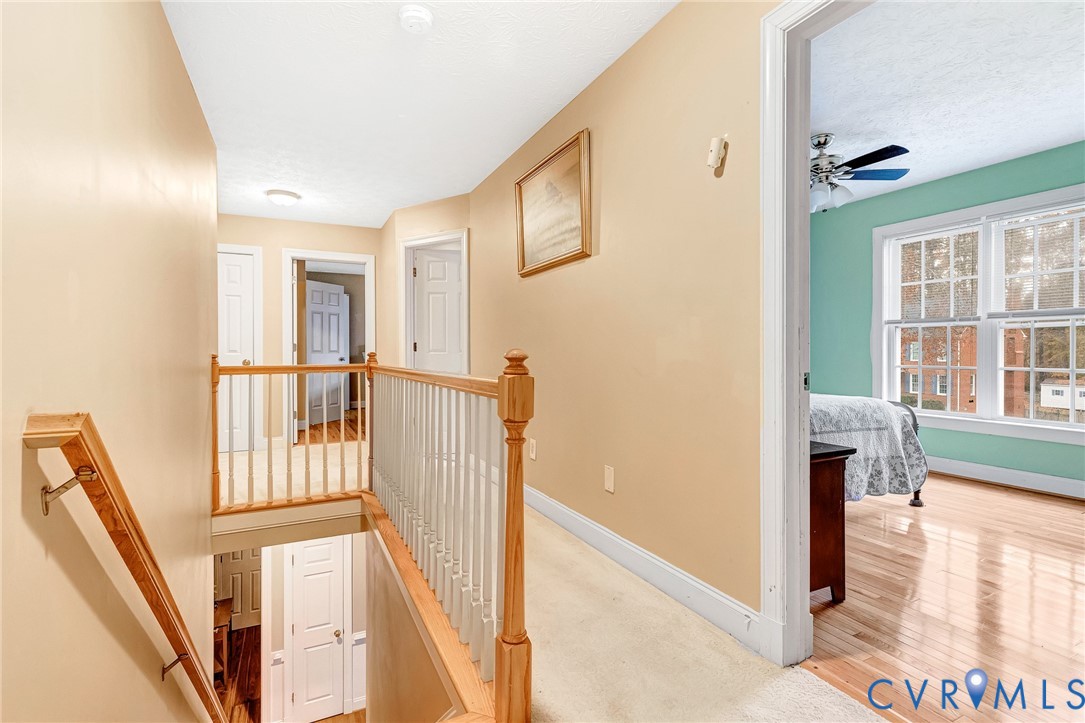 9212 Wyattwood Road Mechanicsville, VA 23116 - Photo 31 of 47 a view of an entryway with wooden floor and a livingroom