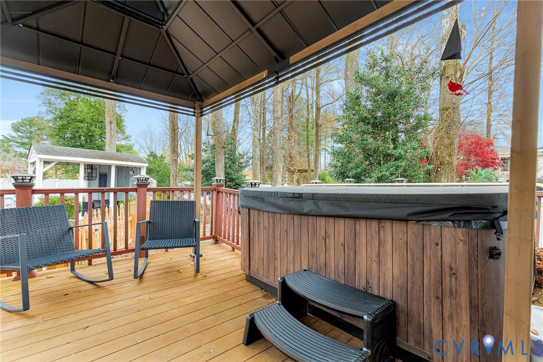 9212 Wyattwood Road Mechanicsville, VA 23116 - Photo 39 of 47 a view of a chairs and table in patio next to a yard