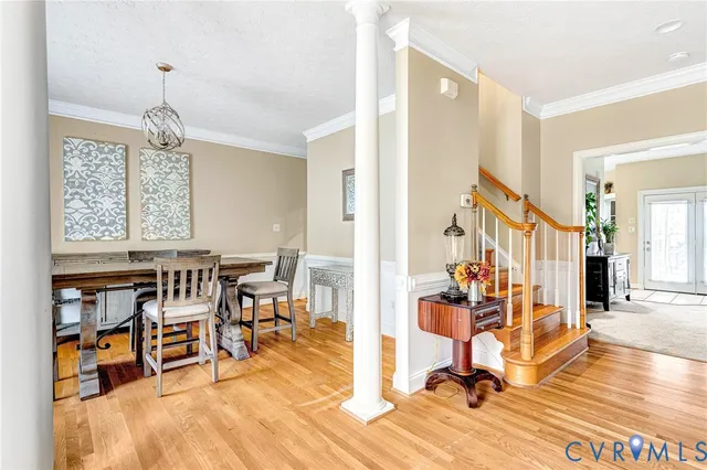 a view of a living room and dining room