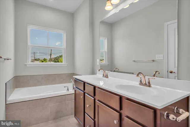 a bathroom with a sink and a bathtub