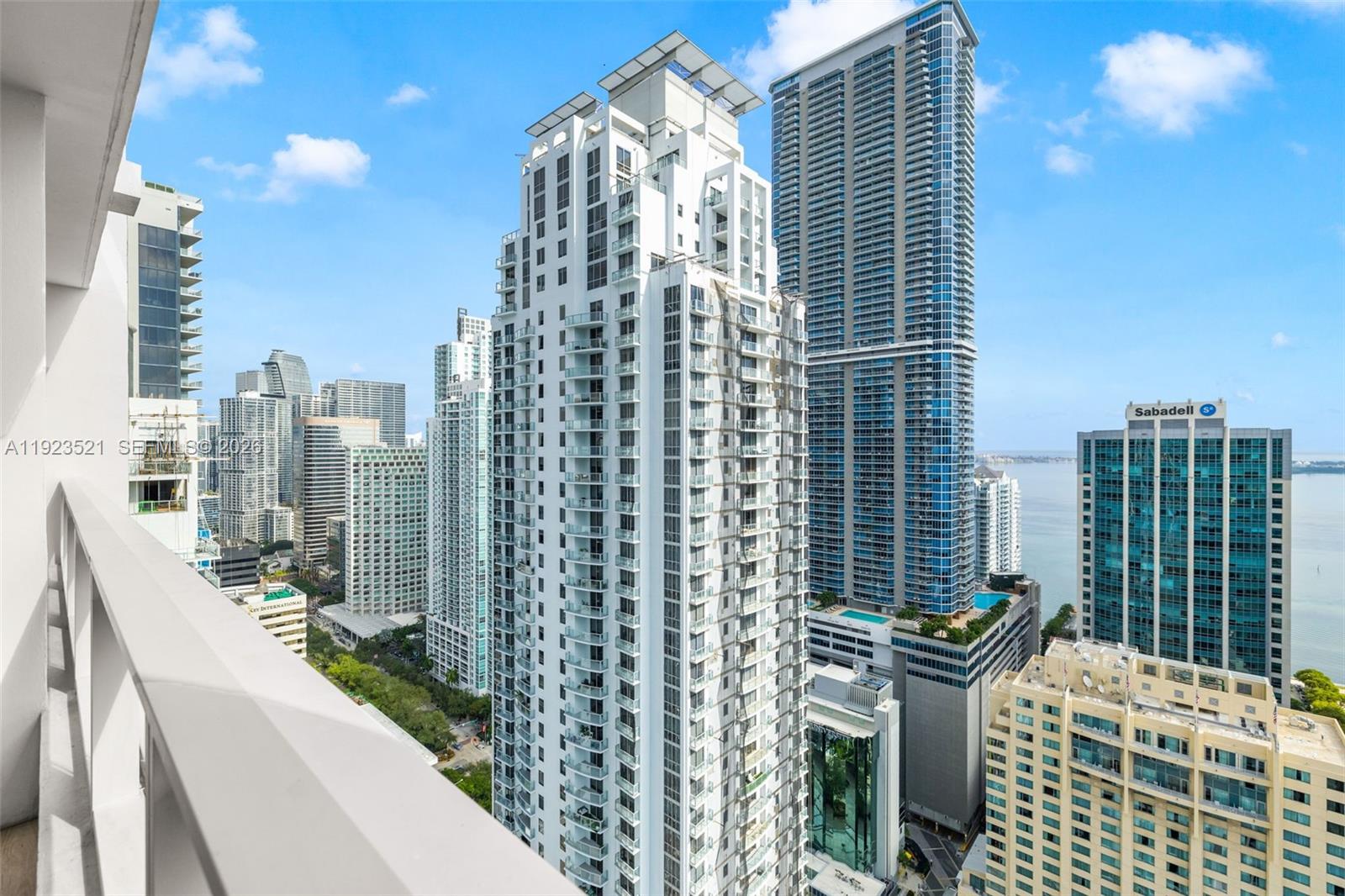 1080 Brickell Avenue, Unit 3602 Miami, FL 33131 - Photo 11 of 45 a view of balcony with a couple of cars parked in front of it