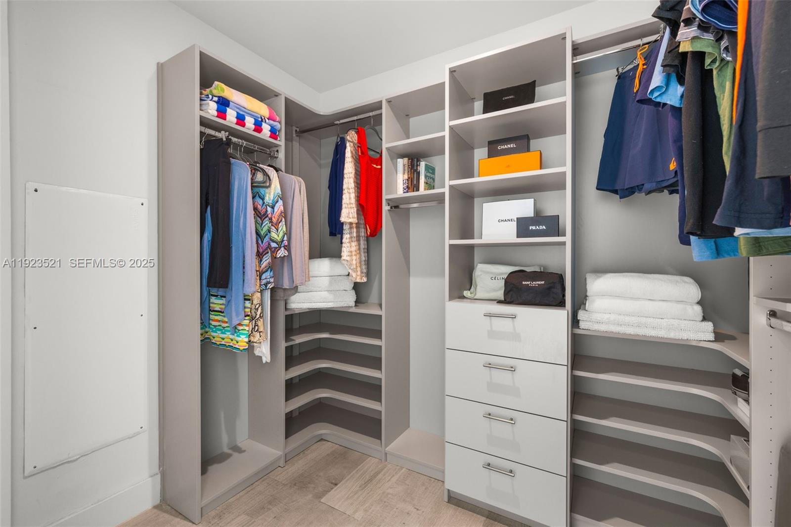 1080 Brickell Avenue, Unit 3602 Miami, FL 33131 - Photo 28 of 45 a view of walk in closet and bathroom