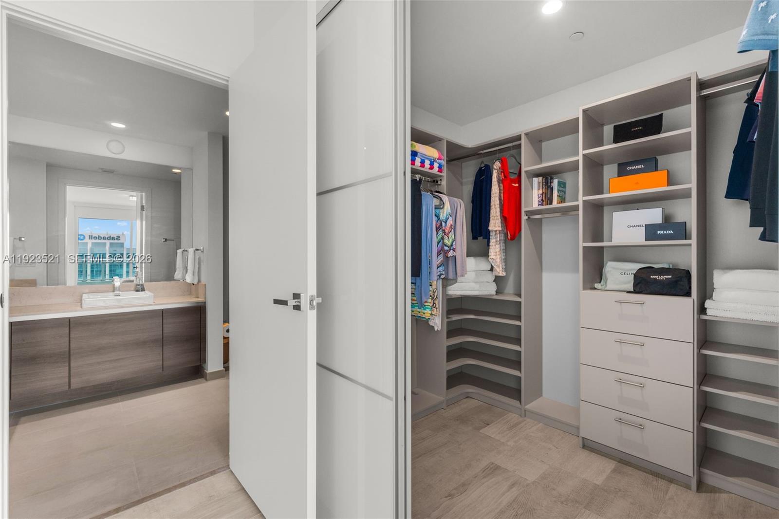 1080 Brickell Avenue, Unit 3602 Miami, FL 33131 - Photo 29 of 45 a view of walk in closet and utility room
