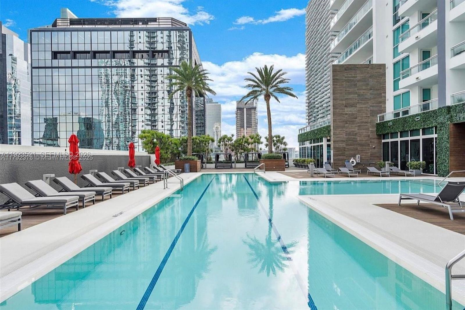 1080 Brickell Avenue, Unit 3602 Miami, FL 33131 - Photo 35 of 45 a view of swimming pool with outdoor seating