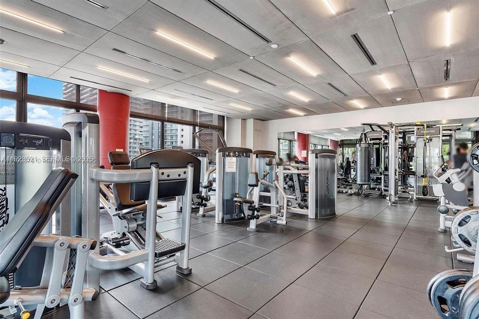 1080 Brickell Avenue, Unit 3602 Miami, FL 33131 - Photo 38 of 45 a view of a room with gym equipment