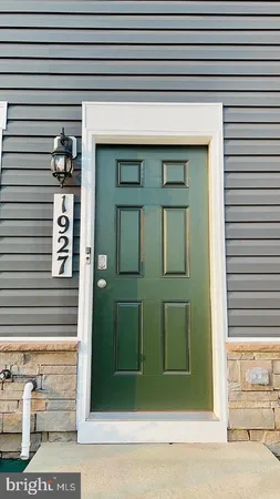 a front view of a house with a garage