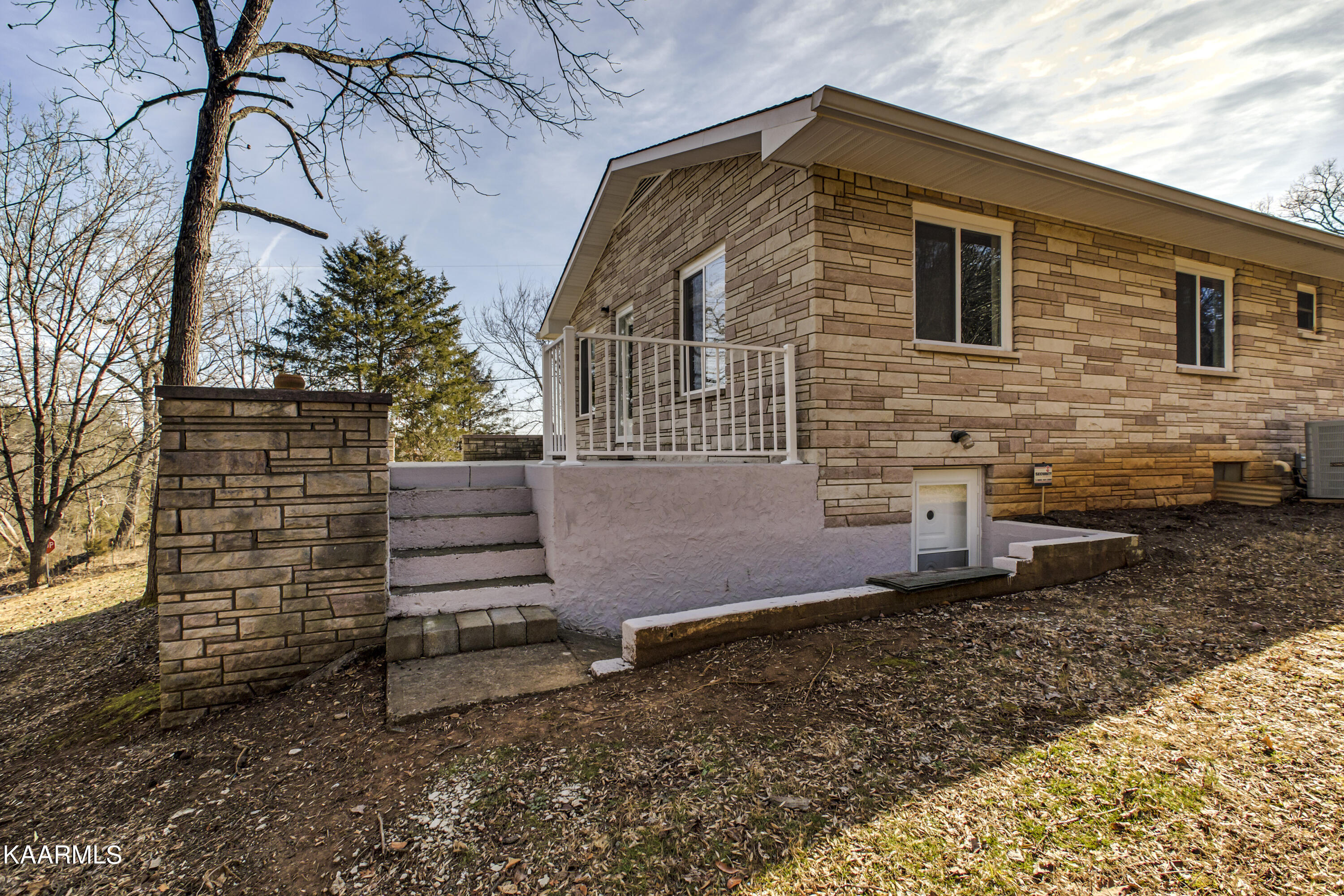 673 Chilhowee School Road Seymour, TN 37865 - Photo 30 of 47 30_ChilhoweeSchoolRoad_673_SidePorch-Bas
