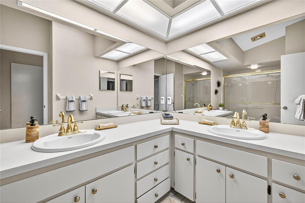 4658 Wallingford Court New Port Richey, FL 34655 - Photo 21 of 48 a bathroom with a sink and a mirror