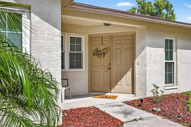 a view of a entryway door front of house