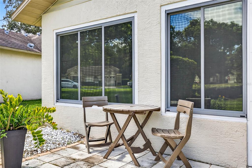 4658 Wallingford Court New Port Richey, FL 34655 - Photo 34 of 48 a building outdoor space with patio furniture and potted plants