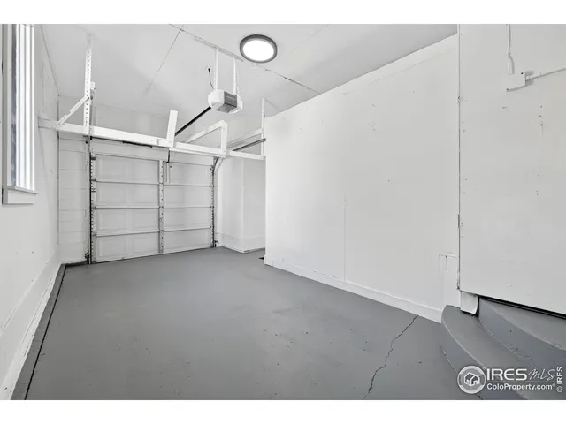 a view of balcony with wooden floor